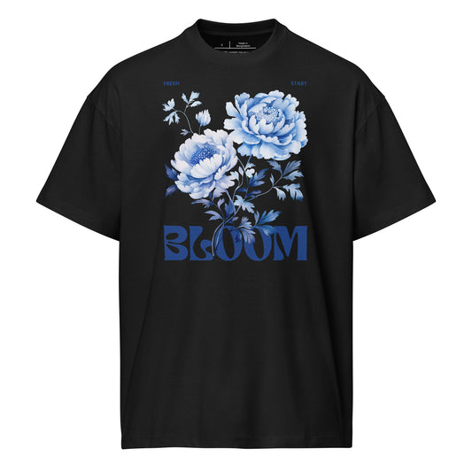 Black t-shirt with blue floral design and 'BLOOM' text on a white background