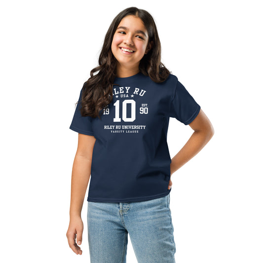 Girl wearing a navy blue t-shirt with a graphic design on a white background
