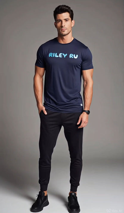 Man wearing a navy blue t-shirt with 'RILEY RU' branding on a gray background