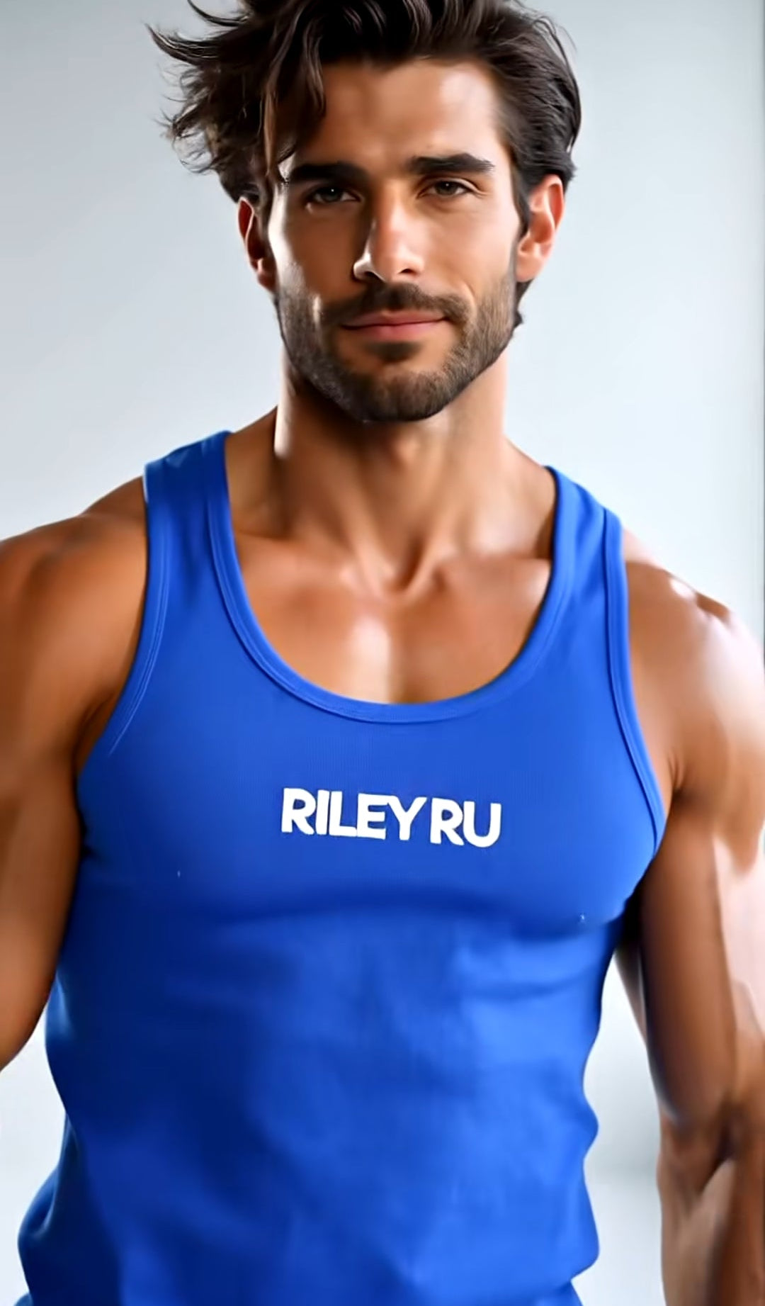 Man wearing a blue tank top with 'RILEY RU' text on a gray background