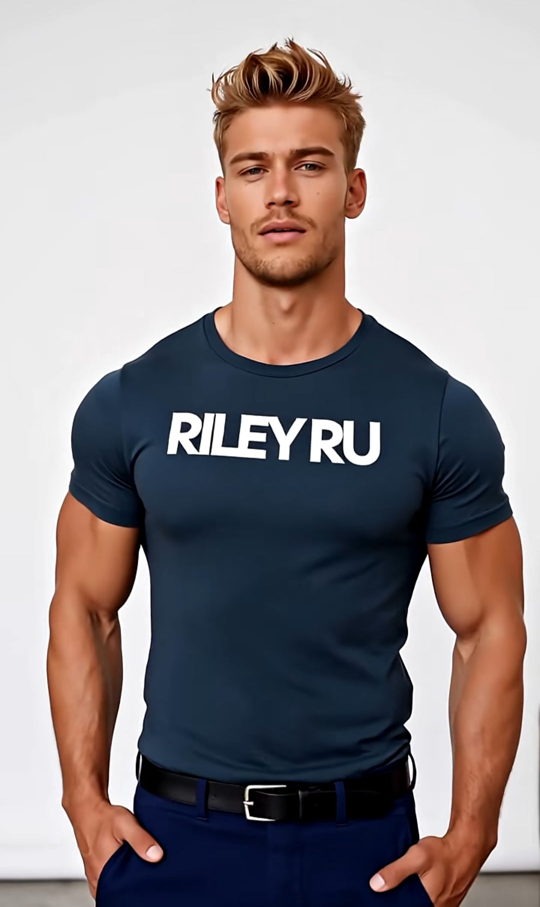 Man wearing a navy blue t-shirt with 'RILEY RU' text on a white background