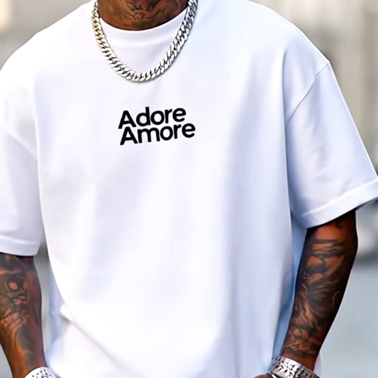 Person wearing a white t-shirt with 'Adore Amore' text, blue jeans, and jewelry.