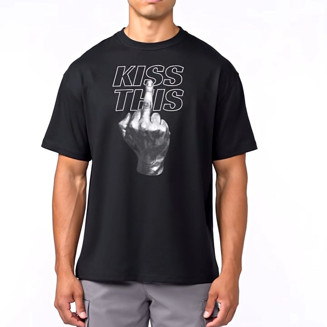 Man wearing a black t-shirt with graphic design and text, standing against a white background