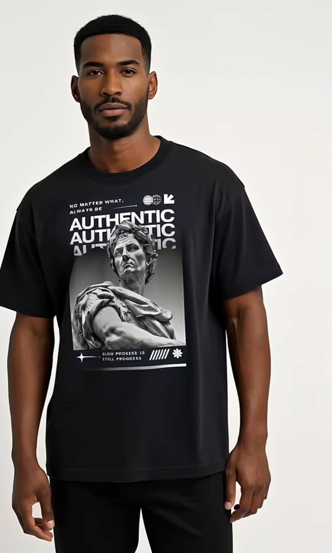 Man wearing a black t-shirt with graphic design on a white background