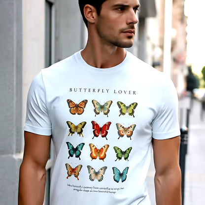 Man wearing a white t-shirt with butterfly design outdoors
