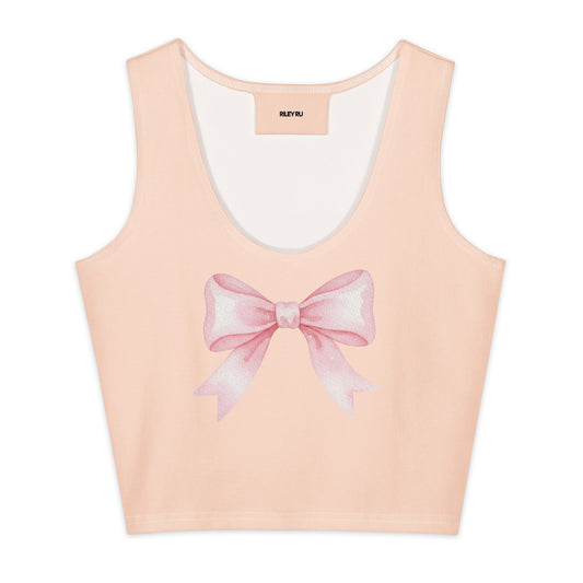 Pink tank top with a large bow design on a white background