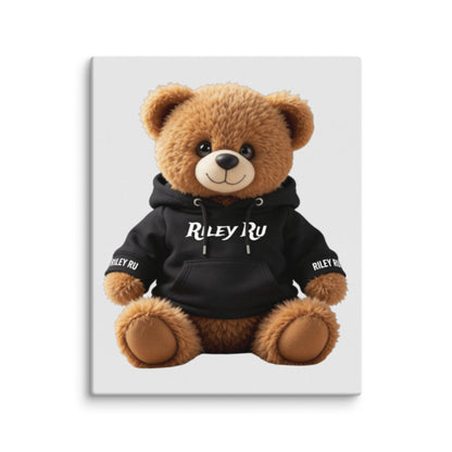 Brown teddy bear wearing a black hoodie with 'Riley Ry' branding on a white background