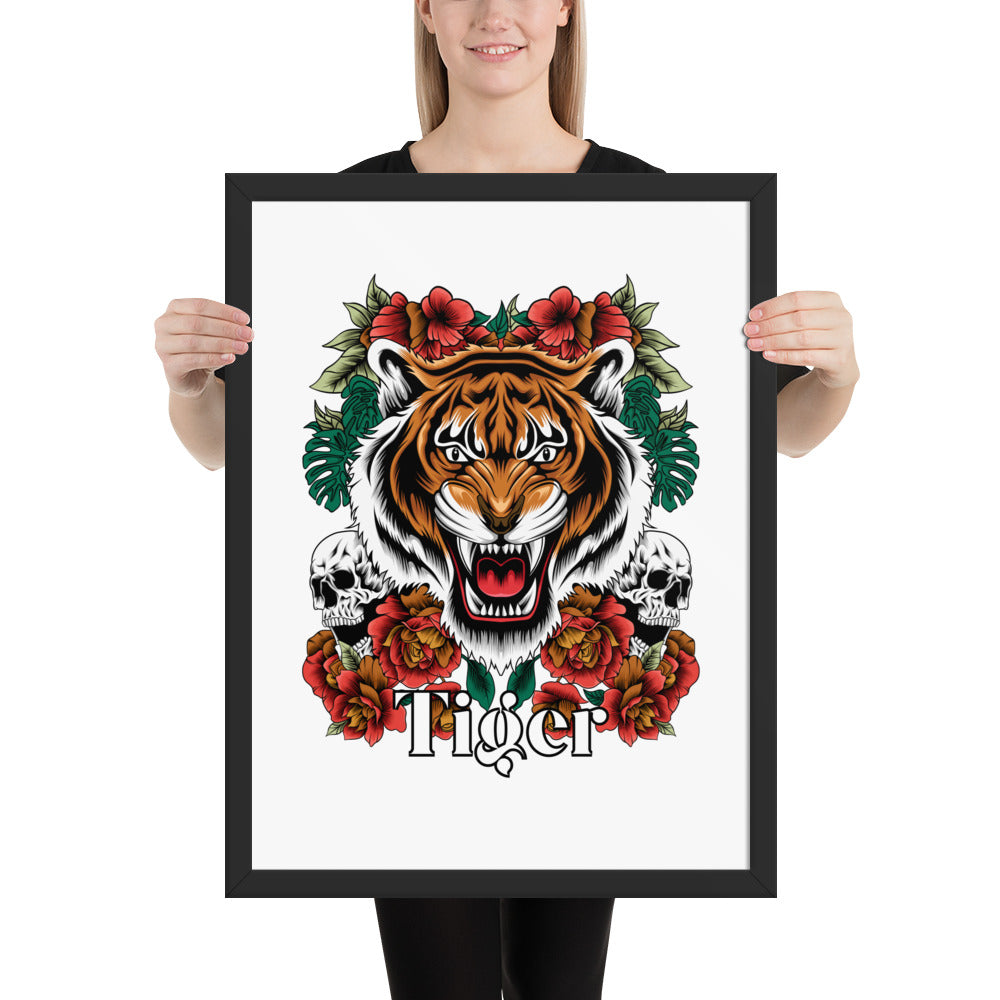 Person holding a framed artwork of a tiger with floral and skull designs.