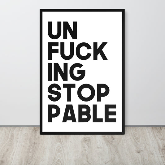 Framed poster with black text 'UNFUCKING STOPPABLE' on a white background