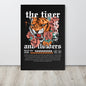 Framed poster with a tiger and floral design on a black background, featuring text and branding.