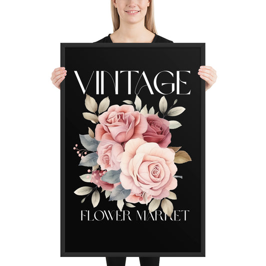 Person holding a framed poster with floral design and text on a white background