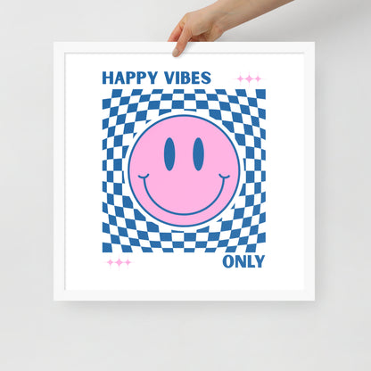 Framed poster with a pink smiley face and 'Happy Vibes Only' text on a checkered background.