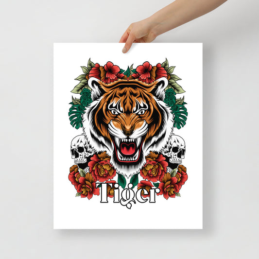 Poster with a tiger design surrounded by flowers and skulls, held up against a white background.