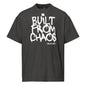 Black t-shirt with 'Built from Chaos' text on a white background