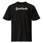 Black t-shirt with 'Ortho Outlaw' text on a white background