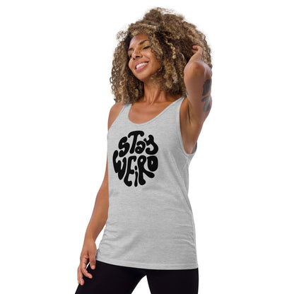 Woman wearing a gray tank top with 'Stay Weird' text on a white background