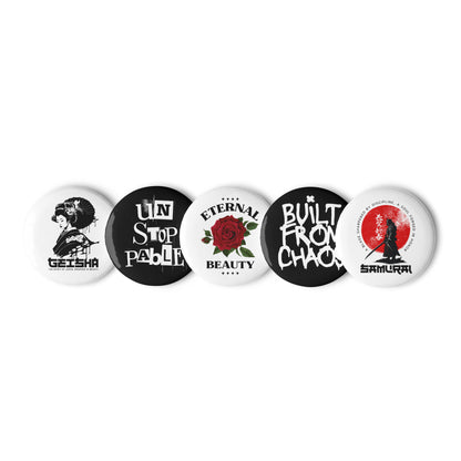 Set of five buttons with various designs and text on a white background