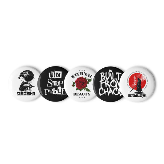 Set of five buttons with various designs and text on a white background
