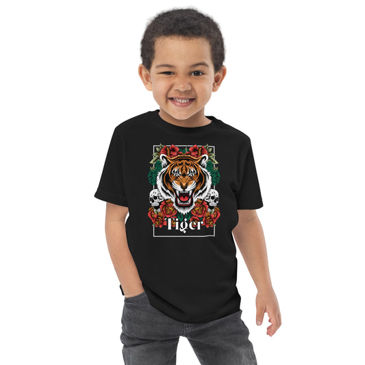 Child wearing a black t-shirt with a white graphic design on a white background