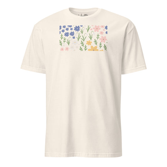 White t-shirt with colorful floral design on a white background