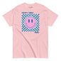 Pink t-shirt with a smiley face and text on a white background