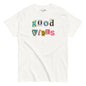 White t-shirt with 'good vibes' text in colorful letters on a white background