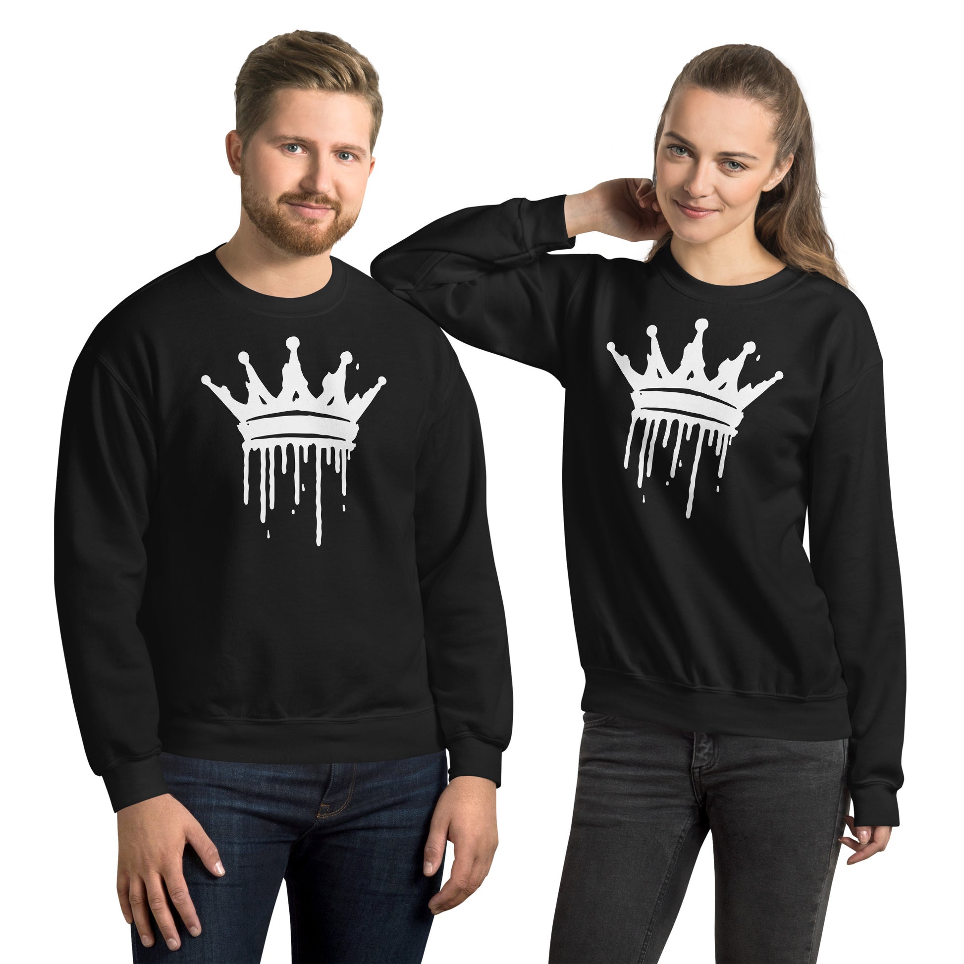 Two people wearing black sweatshirts with a white crown design on a white background