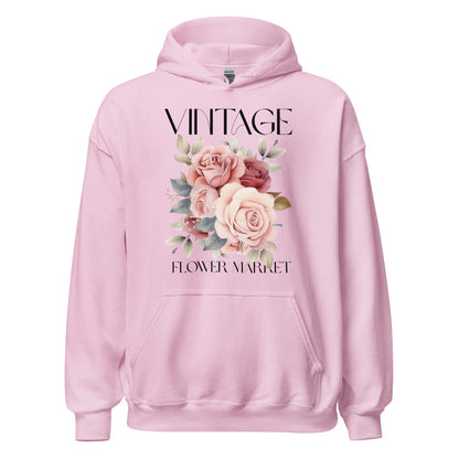 Pink hoodie with floral design and text on a white background