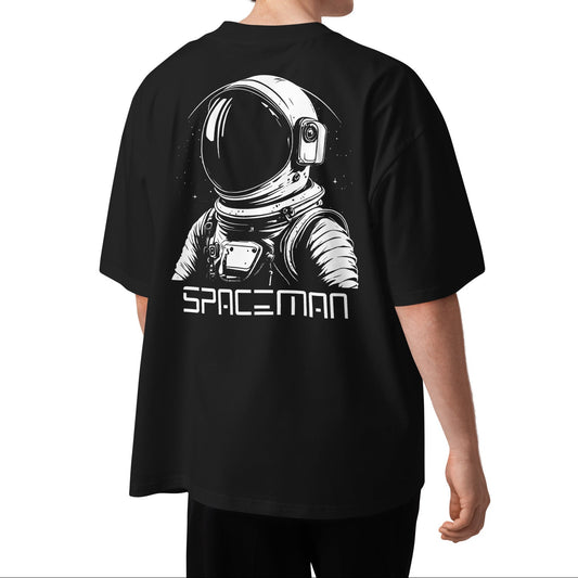 Person wearing a black t-shirt with an astronaut graphic and 'SPACEMAN' text on the back.