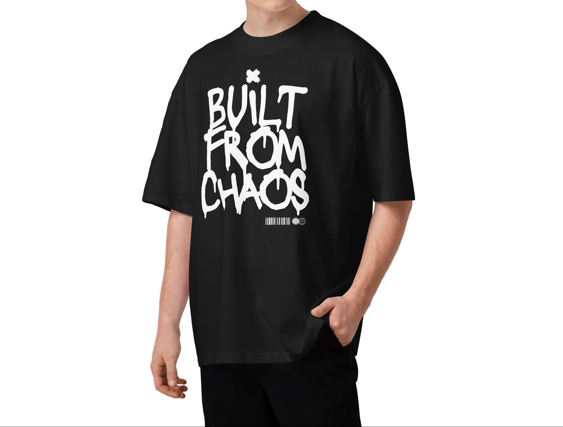 Person wearing a black t-shirt with 'Built from Chaos' text on a white background