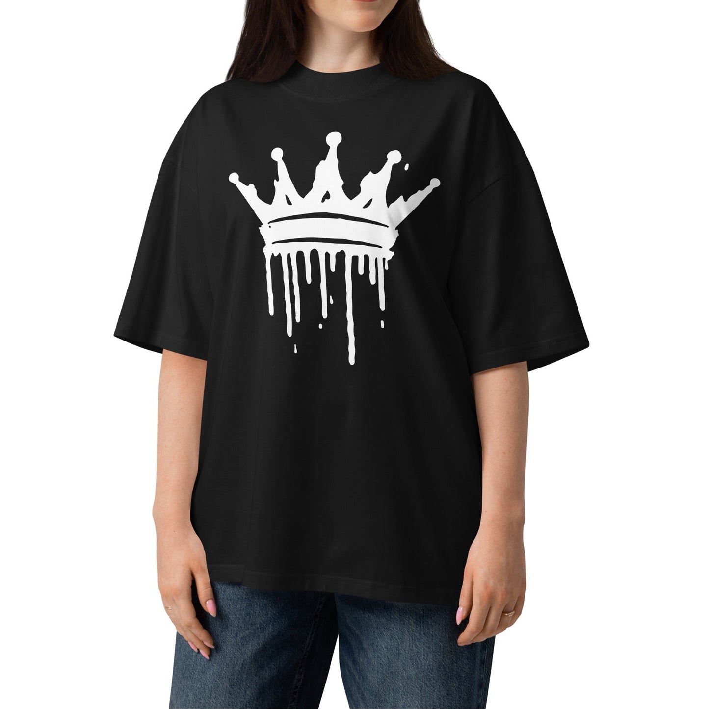 Woman wearing a black t-shirt with a white crown graphic on a white background