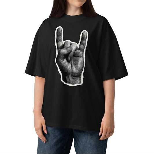 Person wearing a black t-shirt with a graphic design on a white background