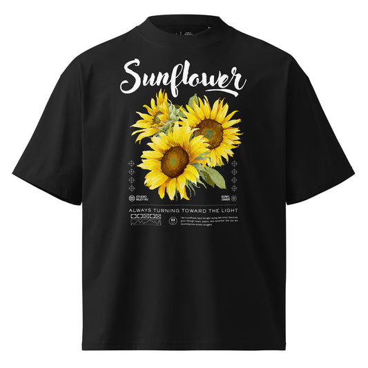 Black t-shirt with sunflower design and text on a white background