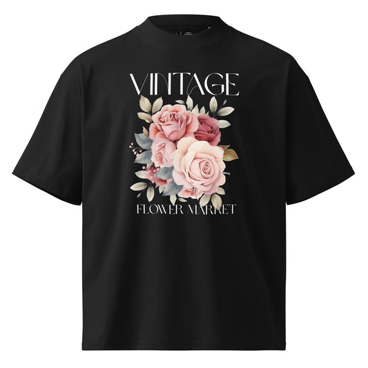 Black t-shirt with floral design and 'Vintage Flower Market' text on a white background