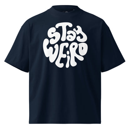 Navy blue t-shirt with 'Stay Weird' text in white on a white background