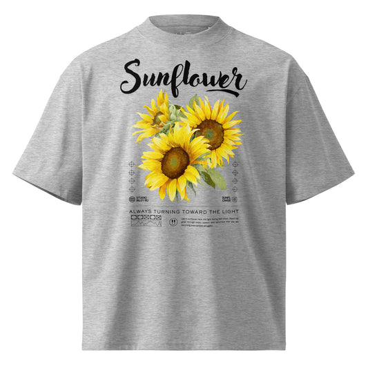 Gray t-shirt with sunflower design and text on a white background