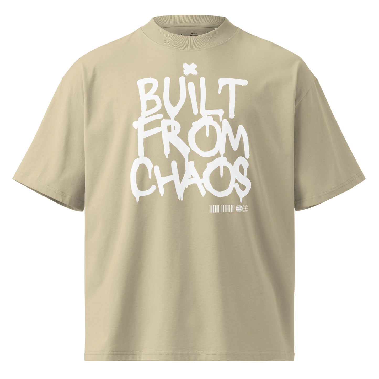 Beige t-shirt with 'Built from Chaos' text on a white background