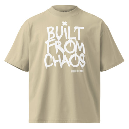 Beige t-shirt with 'Built from Chaos' text on a white background