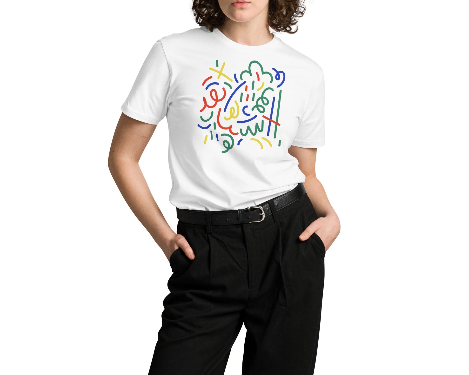 Person wearing a white t-shirt with colorful design on a white background