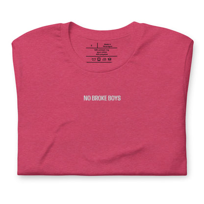 Folded pink t-shirt with 'NO BROKE BOYS' text on a white background