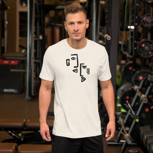 Man wearing a white t-shirt with black abstract design in a gym setting
